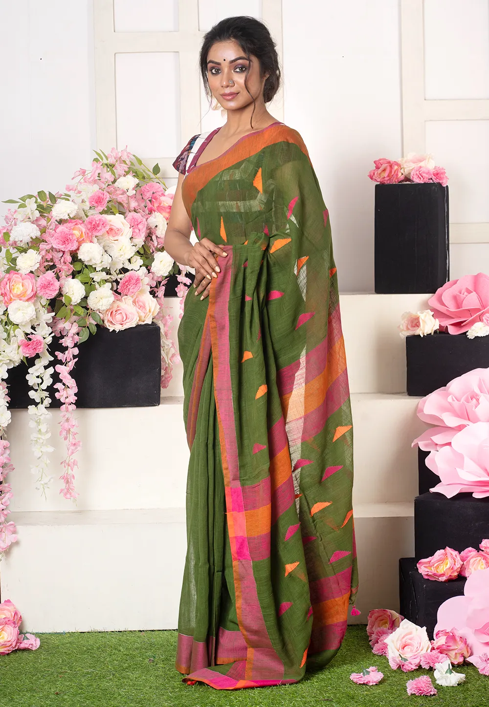 forest green handloom saree with multicolor pyramid motifs 602654309d8ca 1613124656