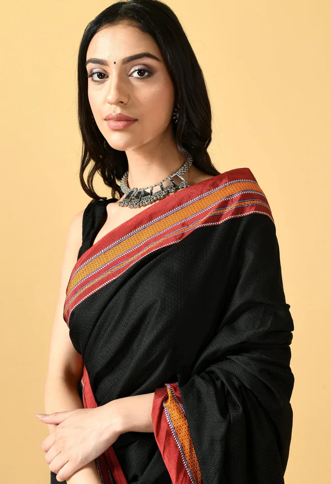black khunn saree with patti pallu and red border